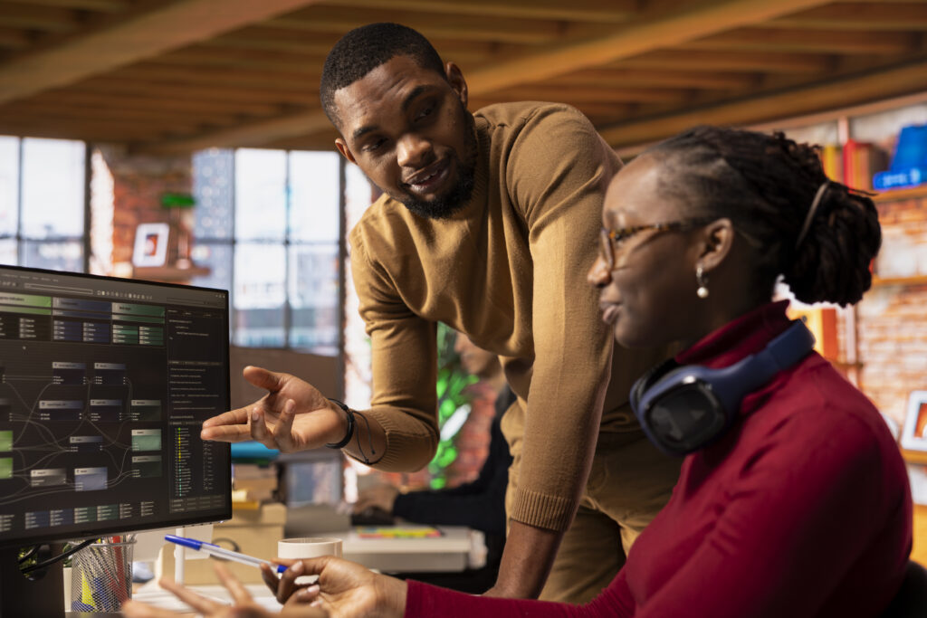 A team collaborating on data and technology in an office